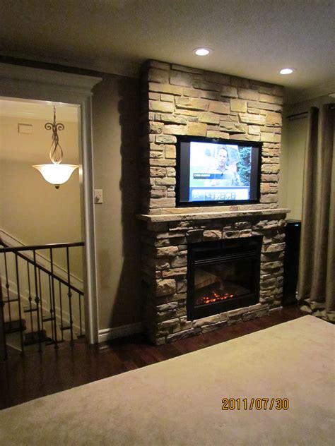Popular stone accent wall exotic natural my favorite home. fireplace with built in TV accent wall | ... own project ...