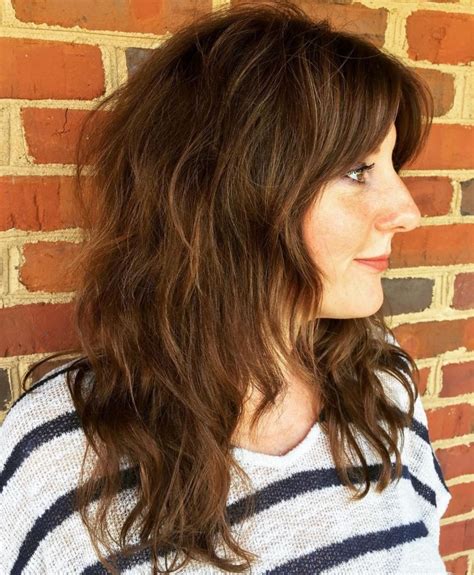 Haircut in layers with curtain bangs. 70 Best Variations of a Medium Shag Haircut for Your ...