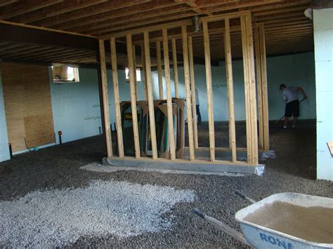 Vapor barrier for basement floor. Building Walnut Farm: The Floors