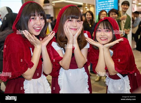 Three Japanese Girls Dressed As Little Red Riding Hood At The Halloween Celebrations In Shibuya