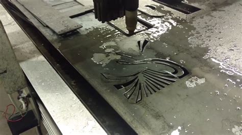 Delusional Designs CNC plasma table cutting some cool artwork. - YouTube
