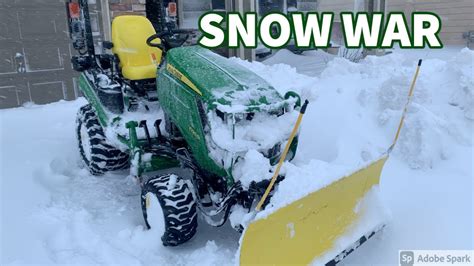 Blizzard Warfare Deep Snow Plowing With John Deere 1025r Youtube