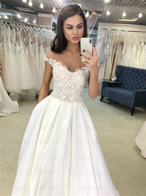 You must be ready with your survey and idea of how much you're willing to spend to pick the perfect. A-Line Off-the-Shoulder Satin Long Wedding Dress with Lace ...