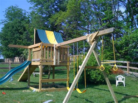 The builder made an effort to keep this swing safe for kids; Building a Swing Set for Backyard Play