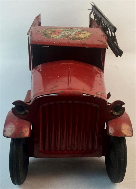sold price antique 1930 s buddy l pressed steel red ladder truck w battery operated headlights