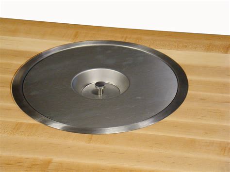 Granite is a common choice for a surface due to its physical properties. Custom Wood Countertop Options - Trash Holes