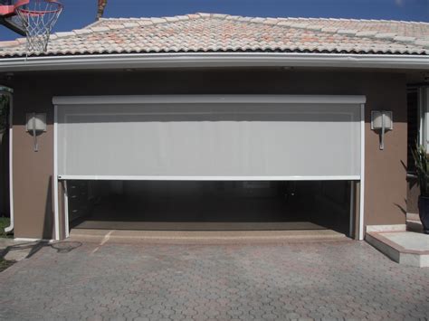 Lifestyle screens garage screen works with your existing garage door to form a secondary screen door that may be used to ventilate and brighten your garage when desired. Retractable Double Garage Door Screen • Knobs Ideas Site