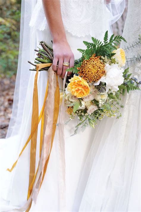 Beautiful Bridal Bouquet Anchored In Marigold Wedding Bouquet Ribbon