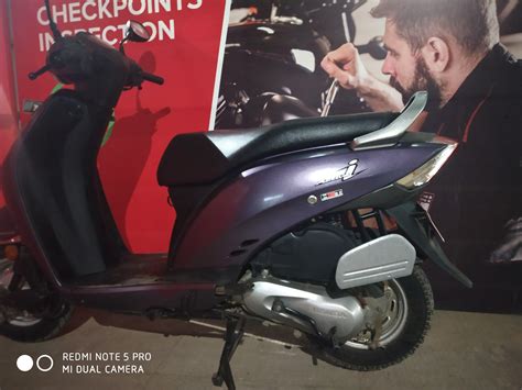 It is equipped with the new esp technology along with incredible new features like the revolutionary silent start, telescopic suspension, double lid external fuel fill,12 inch front wheel and 10%^ more mileage. Honda Activa-i Std refurbished scooter at best price | CredR