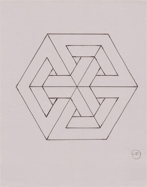 A Drawing Of An Interlocked Design On Paper