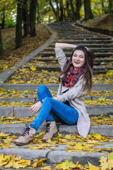 Smiling Girl Sitting On The Stairs Featuring Autumn Beautiful And Nature People Images