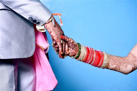 Premium Photo Bride And Groom Hands Together In Indian Wedding