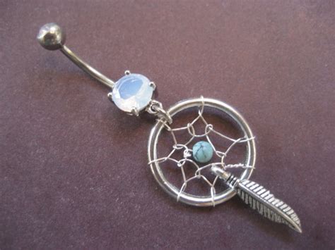 dreamcatcher bellyring if i was 20 lbs skinnier and had my belly button pierced i would need