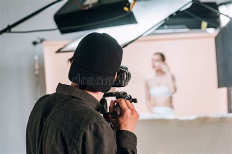 Cameraman Working In Broadcast Television Green Screen Studio R Stock