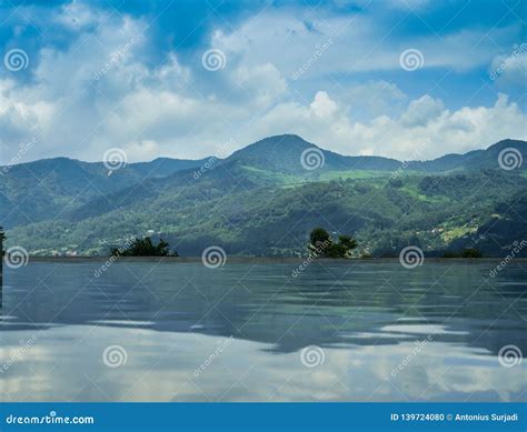 Romantic View Of Beautiful Blue Water Lake On The Horizon Stock Photo