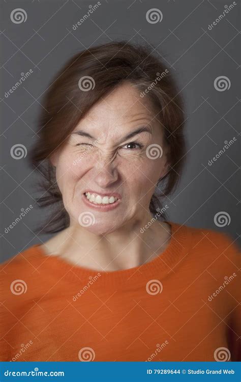 Fun Angry Expression For Winking Middle Aged Woman Blur Effects Stock
