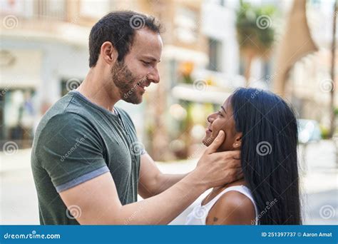 Man And Woman Interracial Couple Hugging Each Other At Street Stock Image Image Of Stand