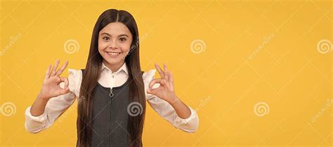 Happy Girl Child In School Uniform Smile Gesturing Double Ok Sings