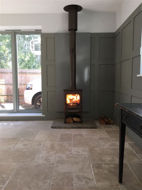 Most wood stoves require heat shields under as well as behind them. Charnwood C4 s/s with Vlaze heat-shield | Wood stove heat ...