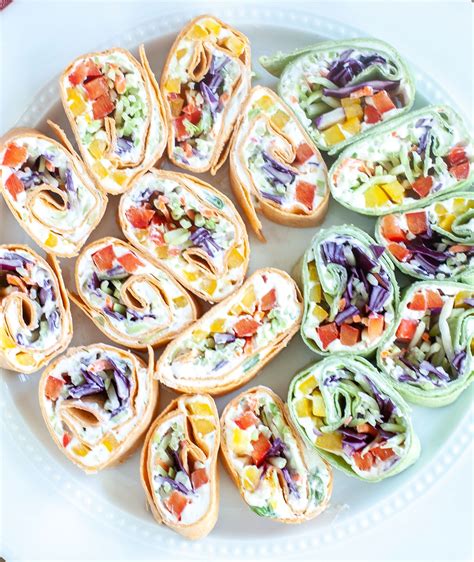 Try these colourful vegan spring rolls as canapés for a party, vibrant with fresh veg and juicy mango. Vegetable Pinwheels | Appetizer recipes, Christmas recipes appetizers