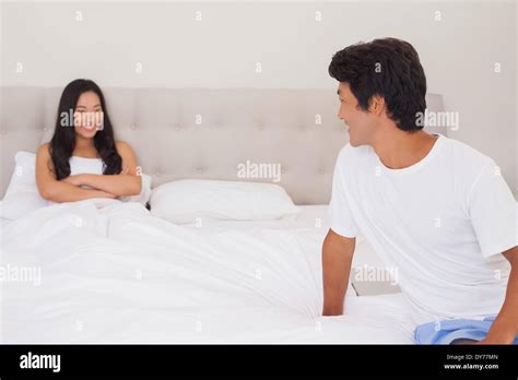 Opposite Couple Hi Res Stock Photography And Images Alamy
