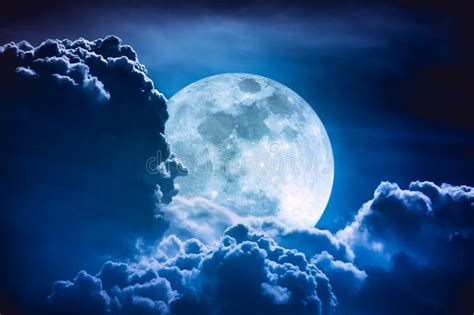 This full moon will be slightly closer to the earth (about 0.1%) than the march full moon was, so this will be the most super of the full supermoons on the evening of the full moon on tuesday, april 7, 2020, as evening twilight ends (at 8:37 pm edt for the washington, dc area), the brightest of the. Super Moon. Nighttime Sky With Clouds And Bright Full Moon ...