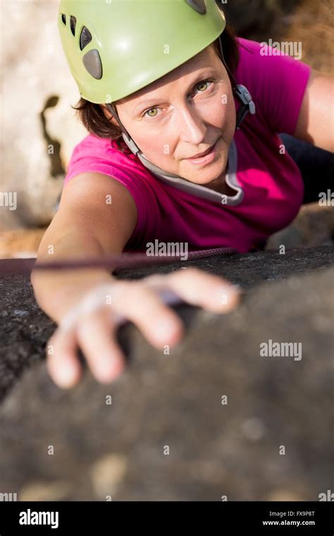 Woman Rock Climbing Stock Photo Alamy