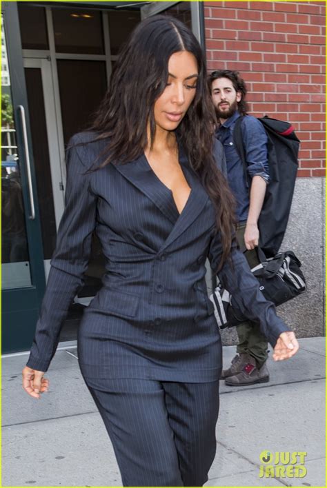 Photo Kim Kardashian Flaunts Her Curves In Pin Striped Suit 04 Photo