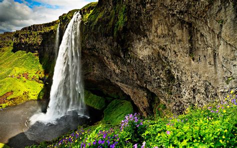 Gorgeous Waterfalls Over A Cliff Wallpaper