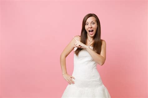 Premium Photo Portrait Of Excited Surprised Woman In White Dress