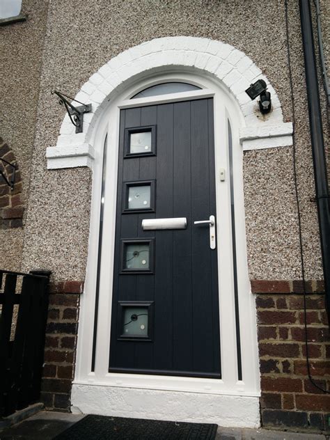 The part arched composite door is set within a full arched frame, but is set off centre giving the entrance a contemporary edge. Specialist Frame Gallery - Aztec Windows (Coventry) Ltd