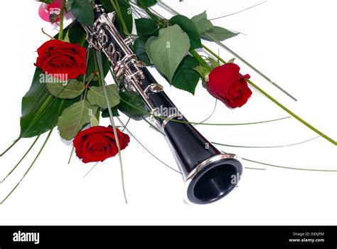 Red Roses And Clarinet Stock Photo Alamy