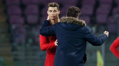 Fan Invades Pitch To Kiss Cristiano Ronaldo During Portugal Friendly