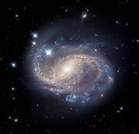 Hubble Captures Majestic Barred Spiral Galaxy Ngc 6956