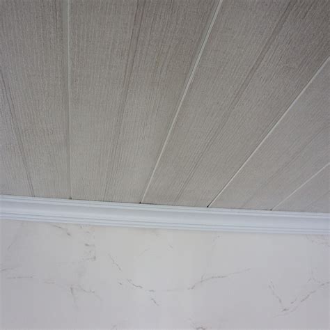 Wood paneling can be used as a backdrop, on an entire wall, on the ceiling, or to make a statement. White Wood Effect Ceiling Panels | www.Gradschoolfairs.com