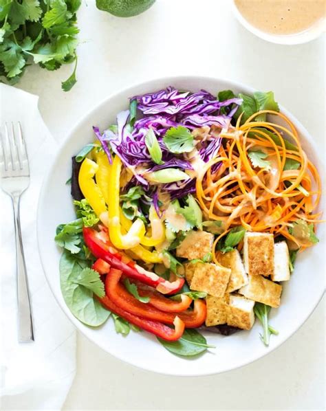 I've always loved coleslaw, and this is basically a thai spin on this thai slaw is outstanding! Thai Salad with Peanut Sauce Dressing - A Couple Cooks