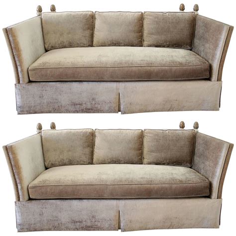 Pair Of Knoll Style Sofas With Acorn Finials In Champagne Velvet