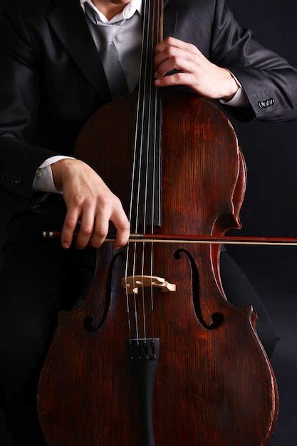 Premium Photo Man Playing On Cello Close Up