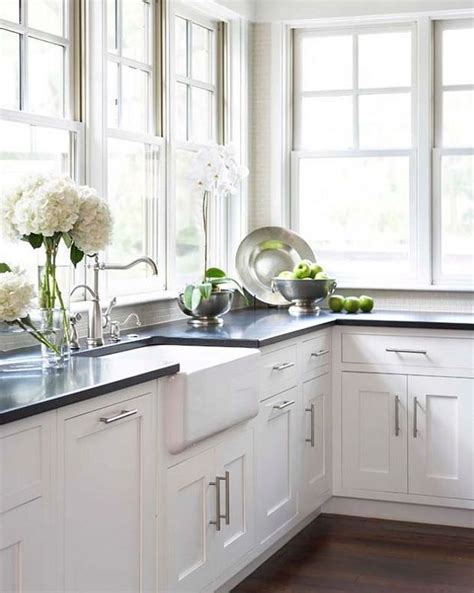We are hoping to do replace our kitchen cabinets in the next year or two and will definitely be keeping our black farmhouse sink. Kitchen: white shaker cabinets, absolute black granite ...