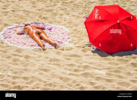 Person Sunbathing Algarve Portugal Stock Photo Alamy