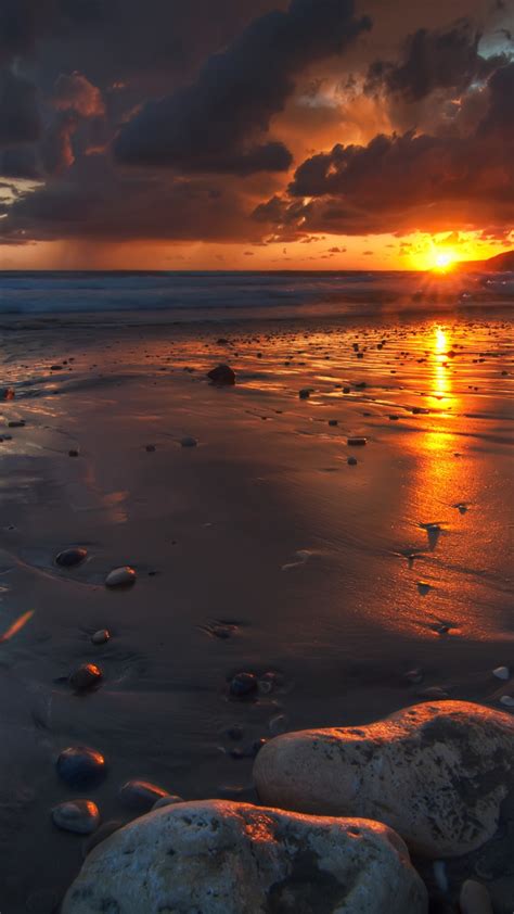 Download Wallpaper 1080x1920 Sunset Rocks Beach Sand Wet
