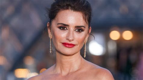 penélope cruz puts a playful spin on the naked trend in a sheer lace jumpsuit glamour