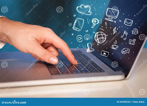 Hand Writing On Notebook Computer With Media Icons Stock Image Image