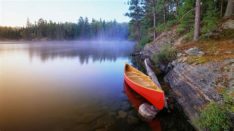 Red Canoe On The Misty Pinetree Lake Algonquin Provincial Park