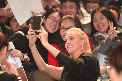 Charlize Theron Takes A Selfie With A Fan At The Chinese Premiere Of