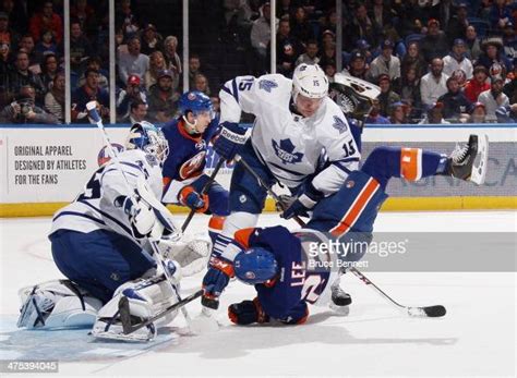 Paul Ranger Of The Toronto Maple Leafs Trips Up Anders Lee Of The New