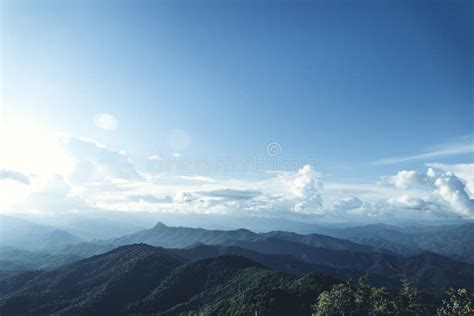 Blue Sky And Mountains In The Evening Beautiful Light Stock Photo