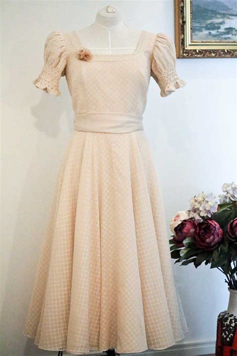 If you are unsure about your wedding guest outfit then a quick scan through our wedding guest outfit rules will help you decide if you are on the right track. Bespoke Smocked Tea Dress | The Vintage Couturière