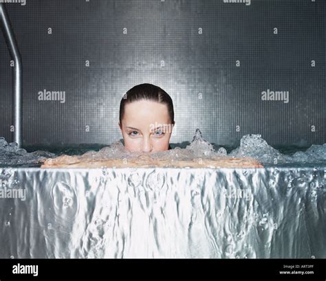 Woman Immersing In Jacuzzi Stock Photo Alamy
