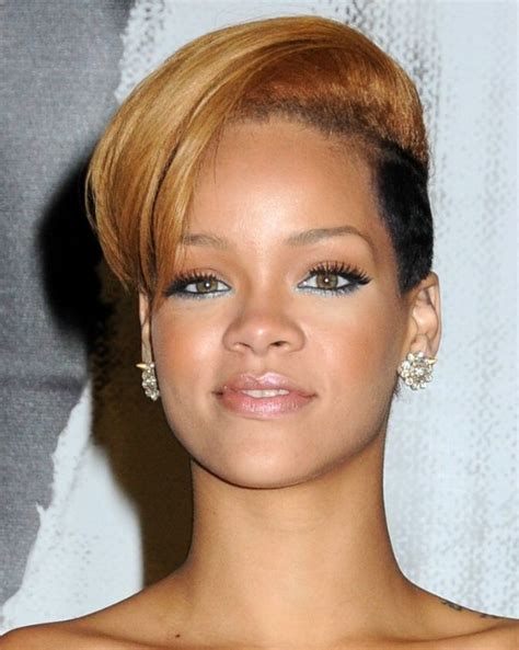 rihanna s new haircut with the hair clipped around her ears